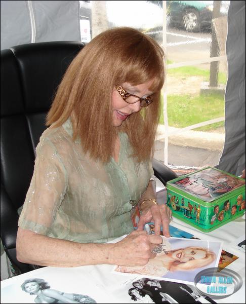 Deanna Lund sporting a red wig