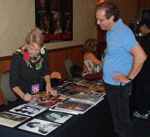 Heather Young signs photo for Kirk
