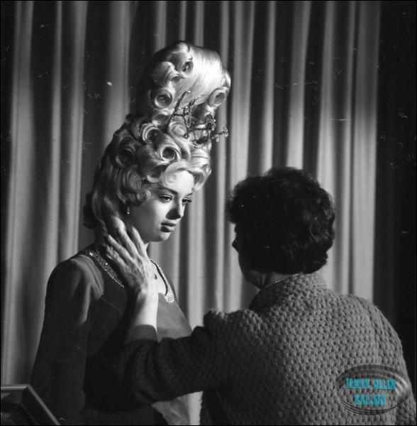 Hairstylist checking Angela's wig