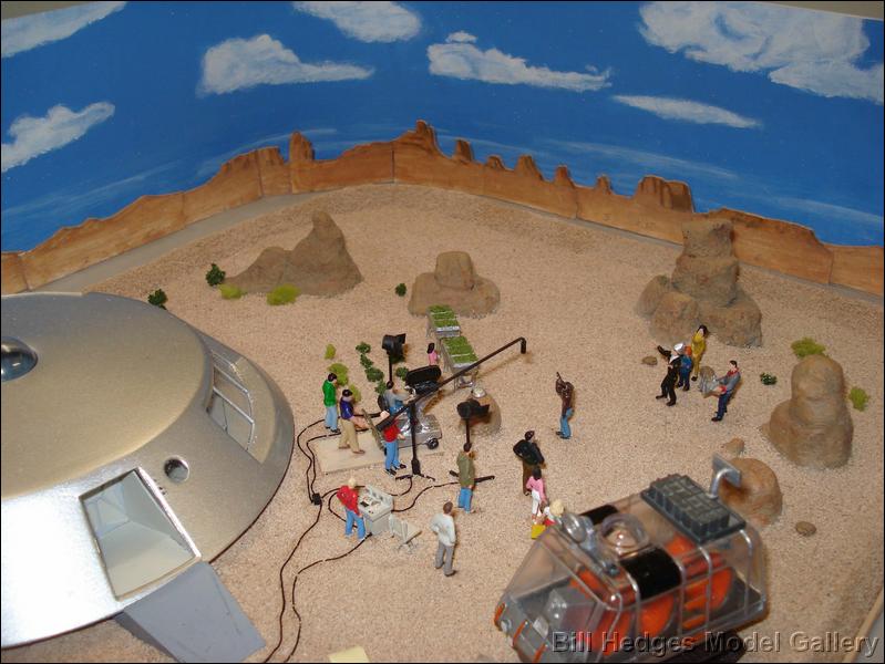 Scene with Small Jupiter 2 on Rock