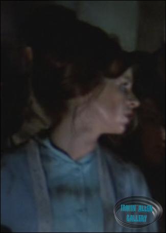Lady in group following Doctor