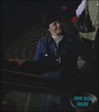 Virginia Piazza - Woman on Lobby Escalator