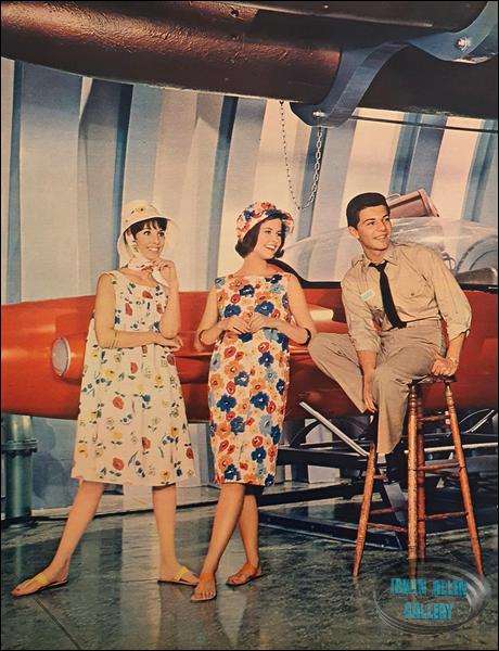Frankie Avalon behind the scenes in the Seaview Missile Room with two hat models