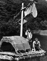 Cameron Mitchell and Martin Milner on the raft