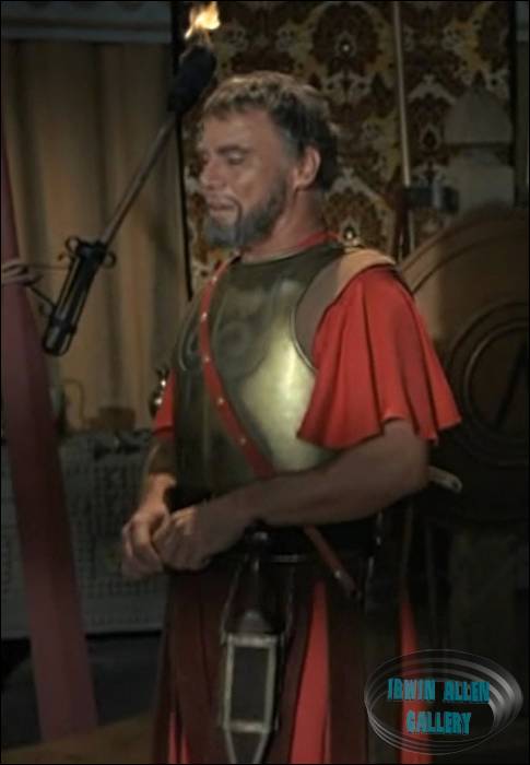 John Doucette with dagger and sword